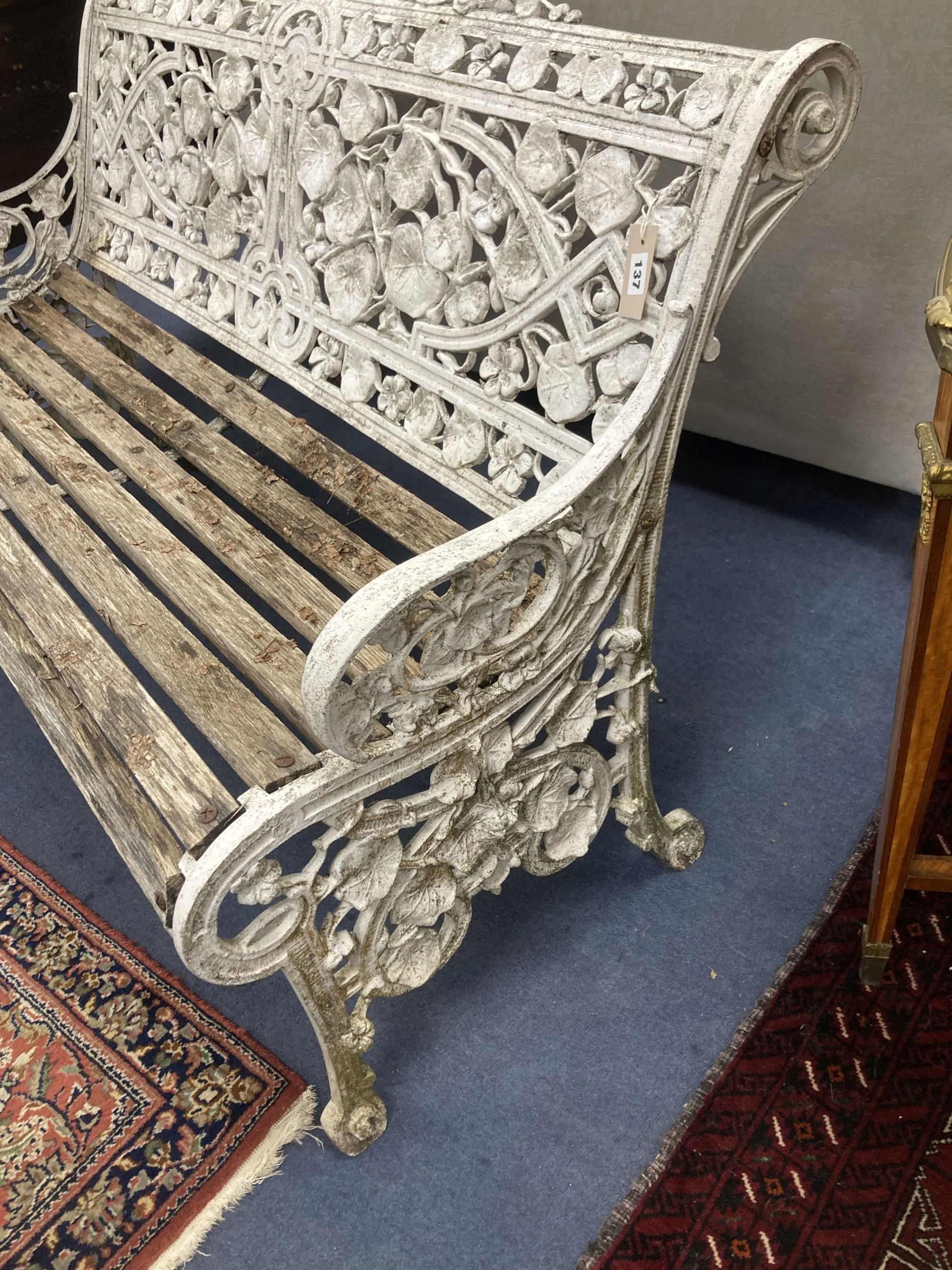 A Coalbrookdale style cast metal Nasturtium pattern garden bench, length 128cm, depth 65cm, height 88cm